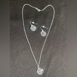 Intricate Silver Necklace and Earring Set